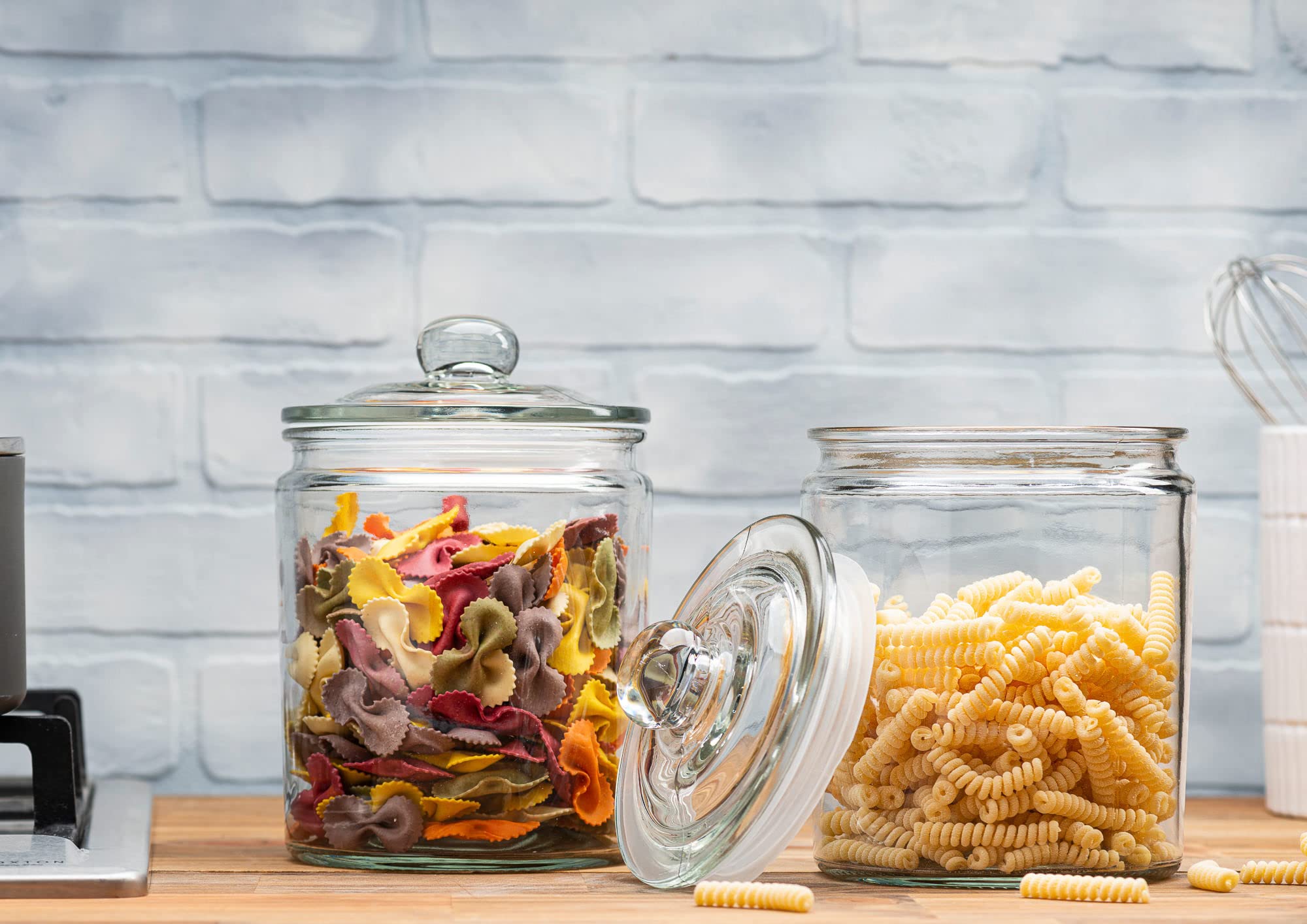 Set of two 1-gallon Le'raze glass canisters with airtight lids.