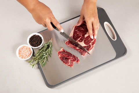 Lexelle cutting board with non-slip edge wrap enhances stability during prep.