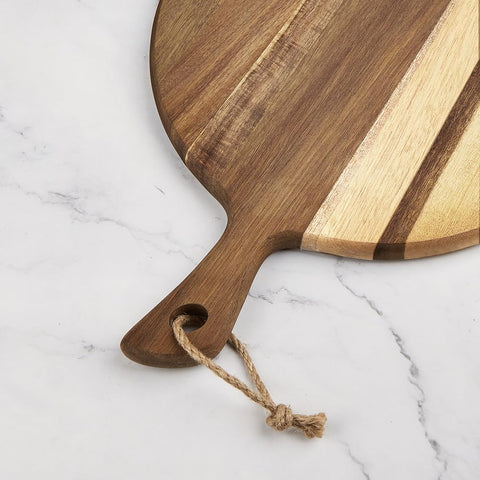 LiebeOlivee acacia cutting board with handle hole, hangs stylishly for easy access.