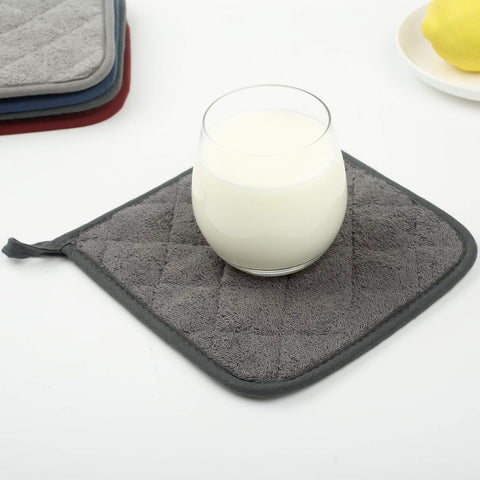 Lifaith spoon rest and jar opener features in a busy kitchen.