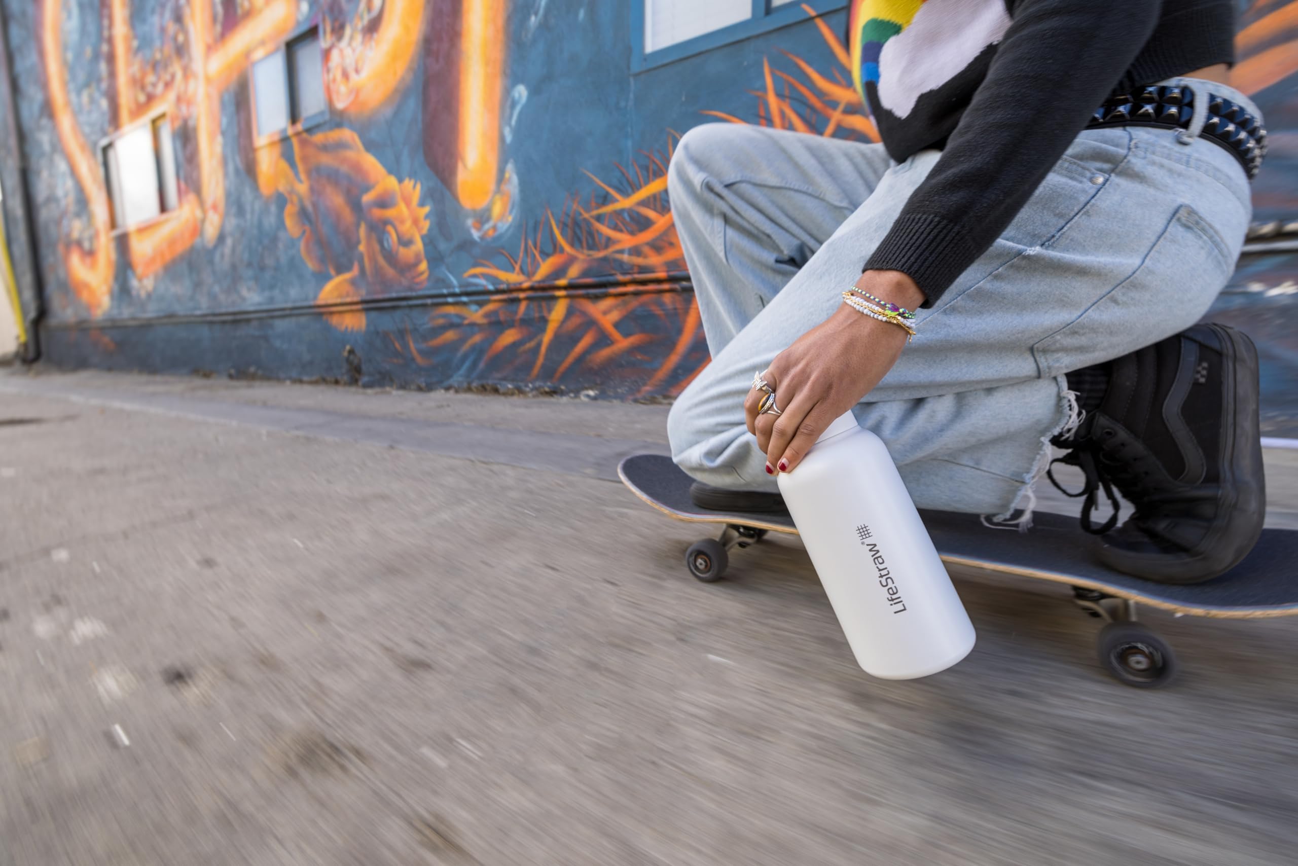 LifeStraw Go packaging and care, highlights eco-friendly reusable bottle benefits.