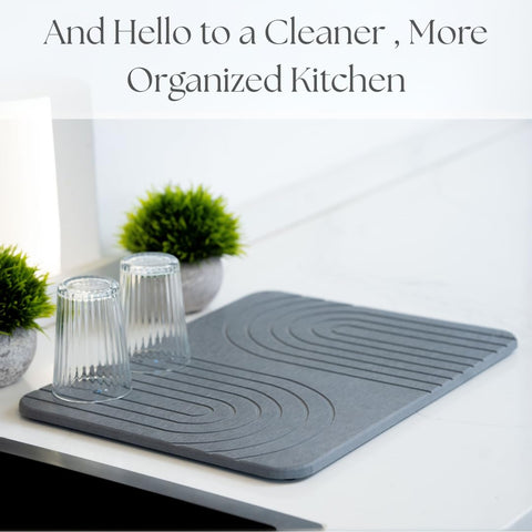 LIFSEZY grey diatomite mat blends with modern kitchen decor.