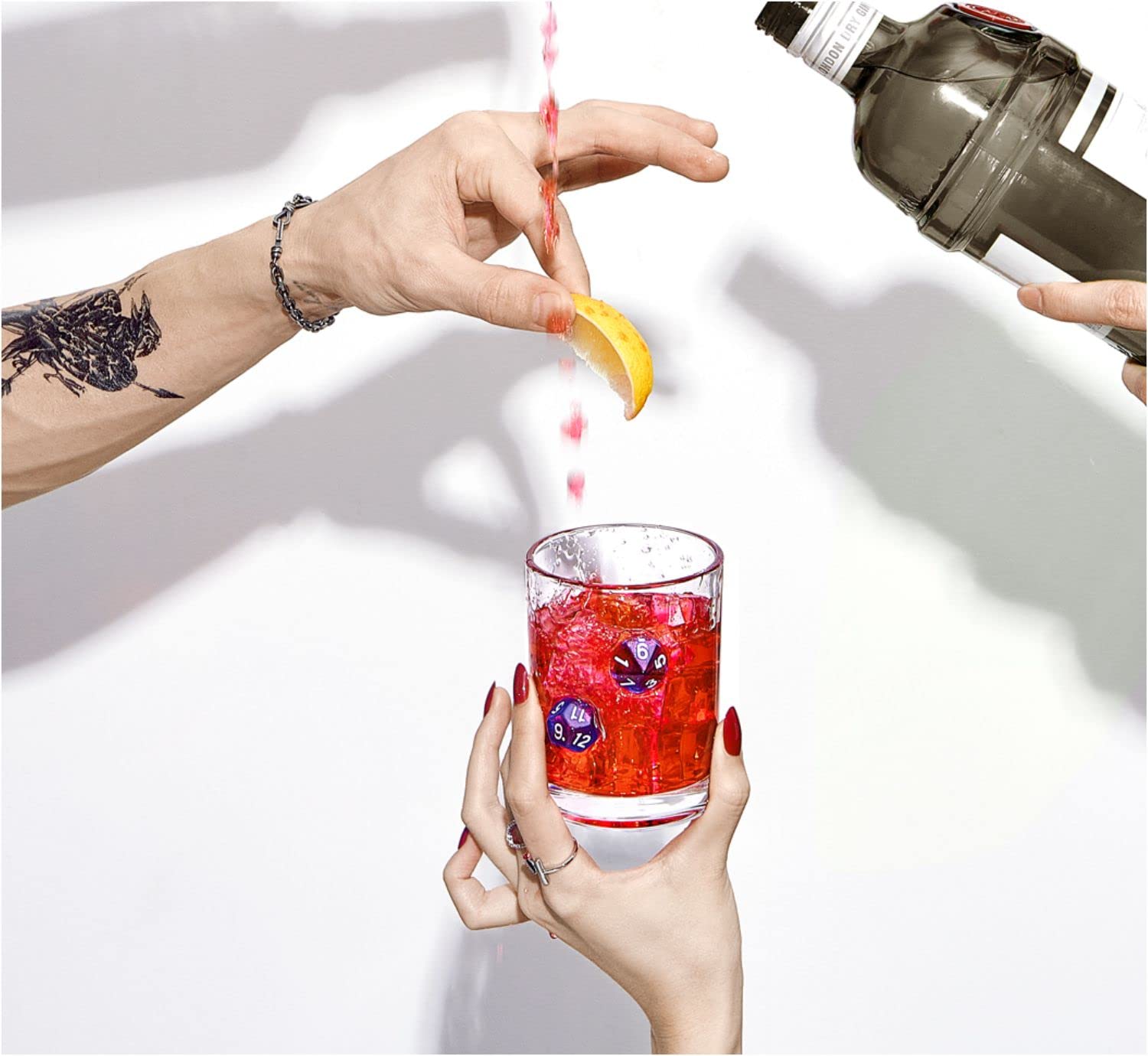 LIIGEMI dice-embedded glass adds a dramatic table centerpiece for spirits.