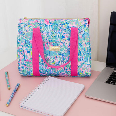 Lilly Pulitzer bold print polyester tote showcases iconic style.