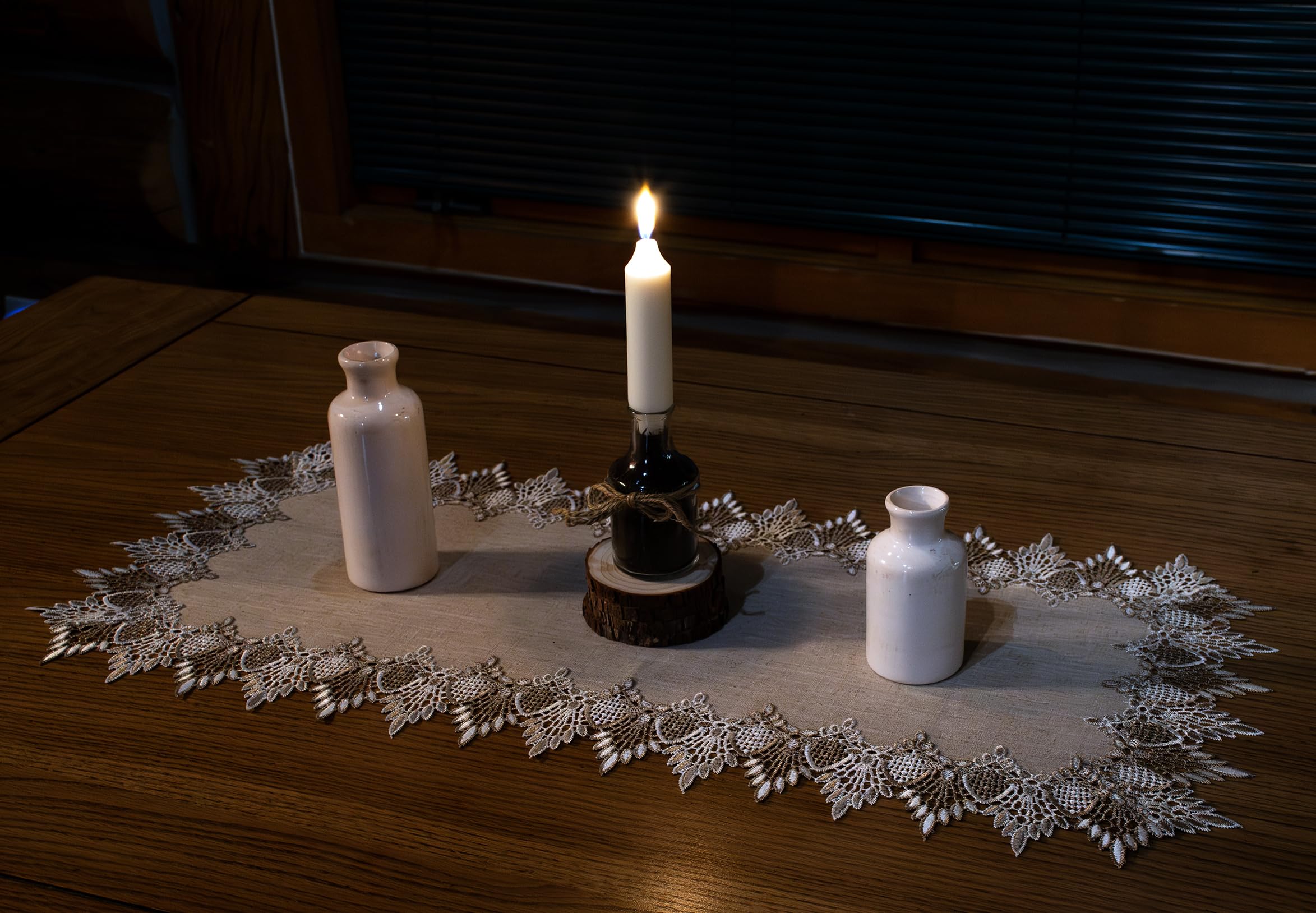 Linens, Art and Things lace runner protects surfaces while showcasing centerpieces.
