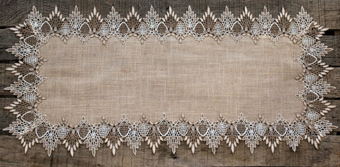 Linens, Art and Things lace runner is machine washable for easy care.