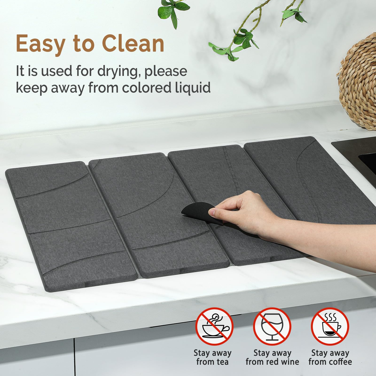 Linidcoud drying mat on counter near sink for bottles and utensils