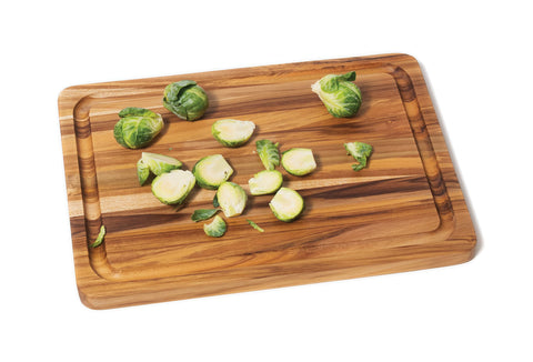 Lipper International teak board on kitchen counter ready for prep tasks