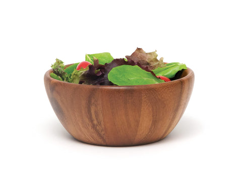 Lipper International acacia round flair bowl on a coffee table adds warmth and charm.