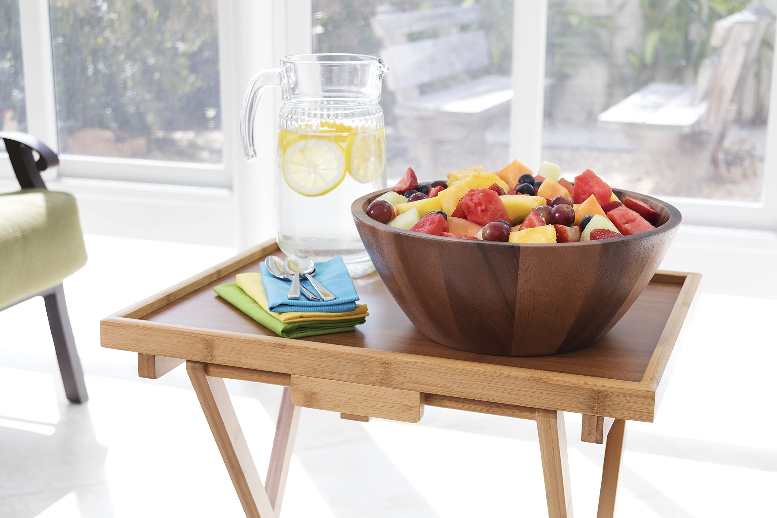 Lipper International Acacia Round Flair Bowl has a four-and-a-half inch height.