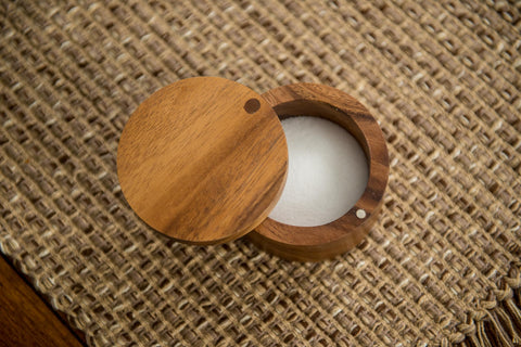 Lipper acacia box on dining table complements condiments and spices.
