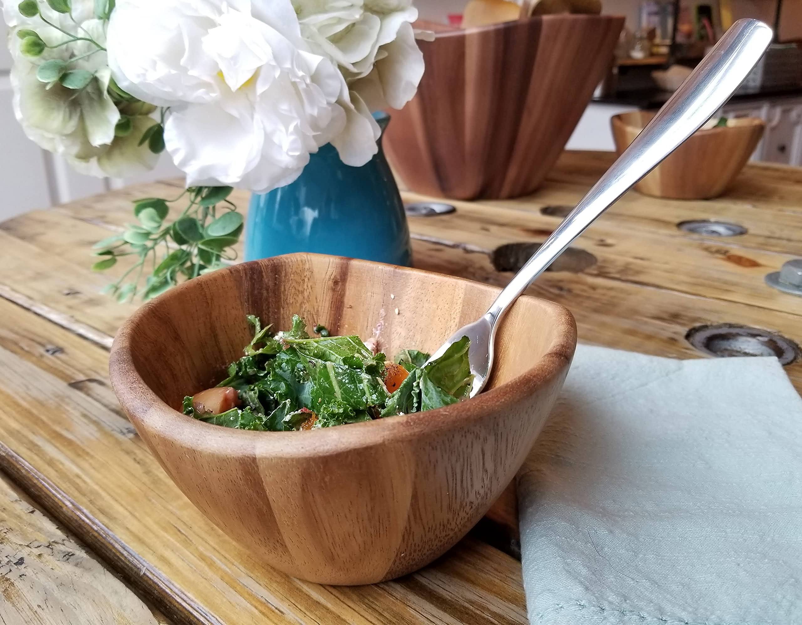 Lipper International acacia bowl requires hand wash to preserve finish.