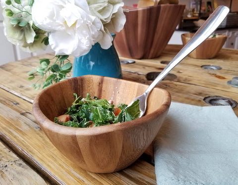 Lipper International acacia bowl requires hand wash to preserve finish.