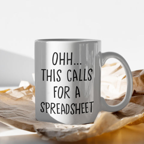 Livinges spreadsheet mug side left; comfortable grip for long workdays.