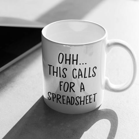 Livinges spreadsheet mug side right; easy sipping during meetings.