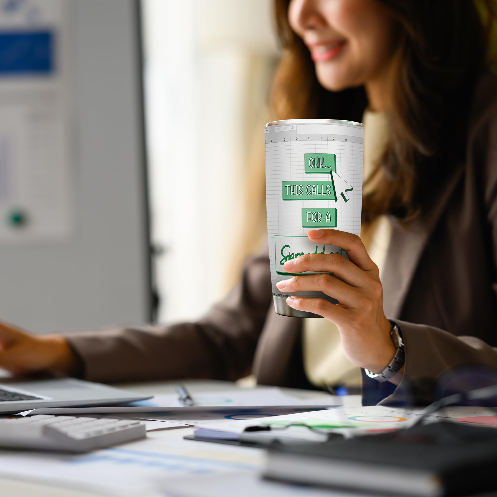 Livinges Spreadsheet Tumbler on office desk; fun gift for managers and accountants.
