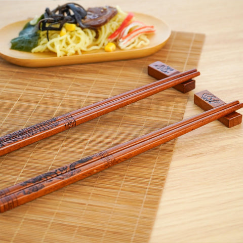 LIXTONGR wooden rests included for stylish chopstick organization.