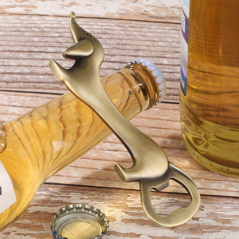 LKKCHER bronze dachshund bottle opener sits beside a gift bag for easy gifting.