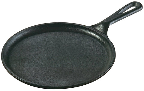 Lodge cast iron griddle with pancakes showing stable heat and easy release for fluffy breakfasts