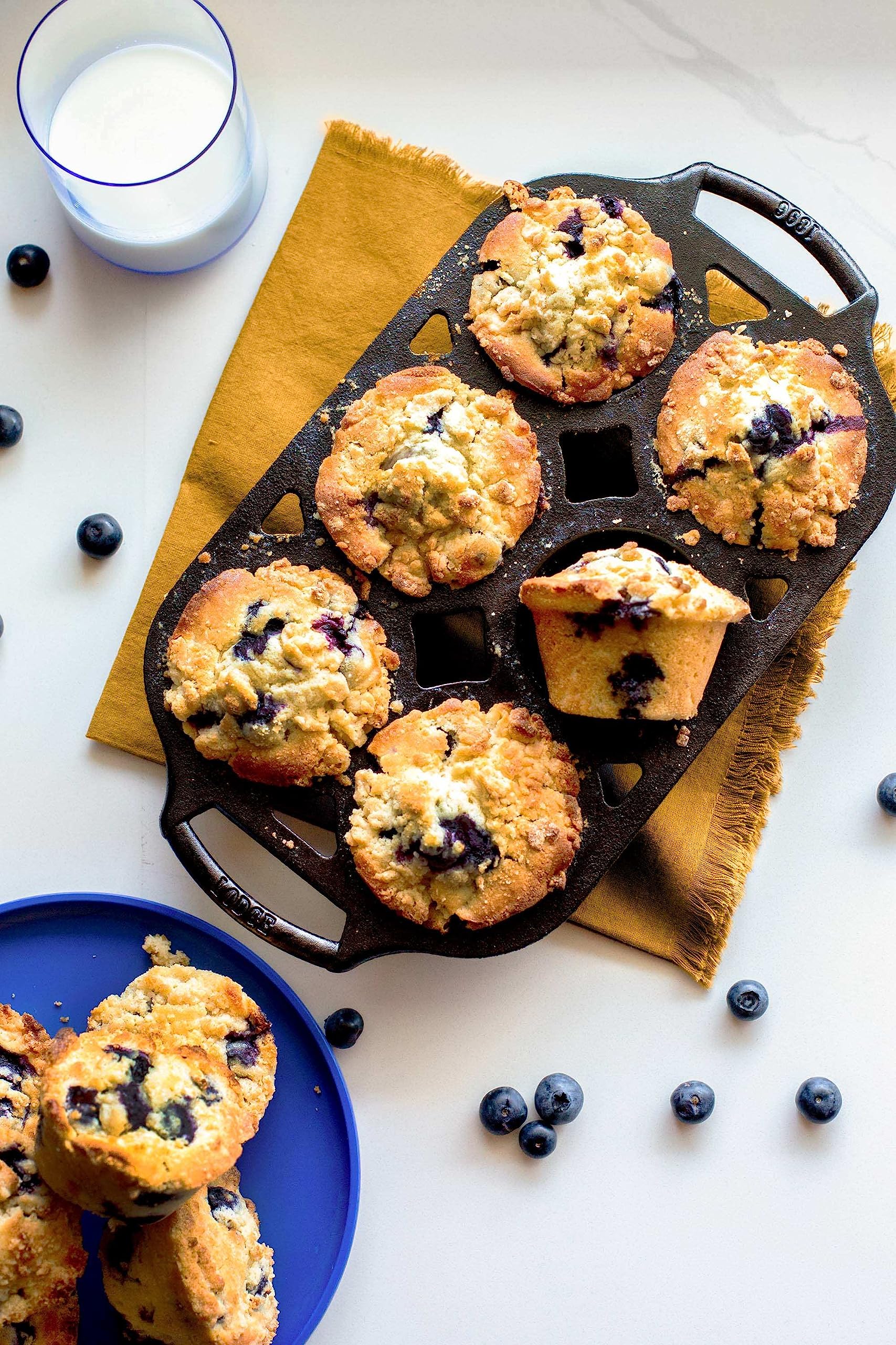 Lodge cast iron muffin pan 6-well close-up shows crisp crust and even browning.