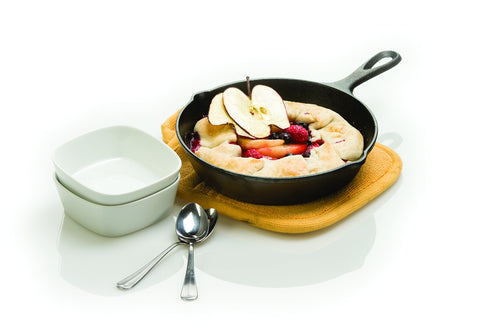 Lodge 8-inch skillet in oven for baking, roasting, and warming dishes.
