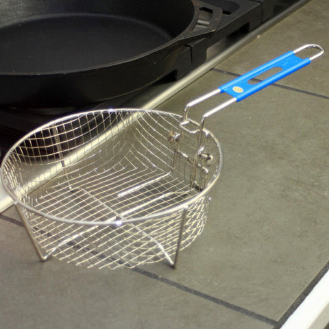 Lodge Deep Fry Basket folding handle for compact storage in a kitchen.