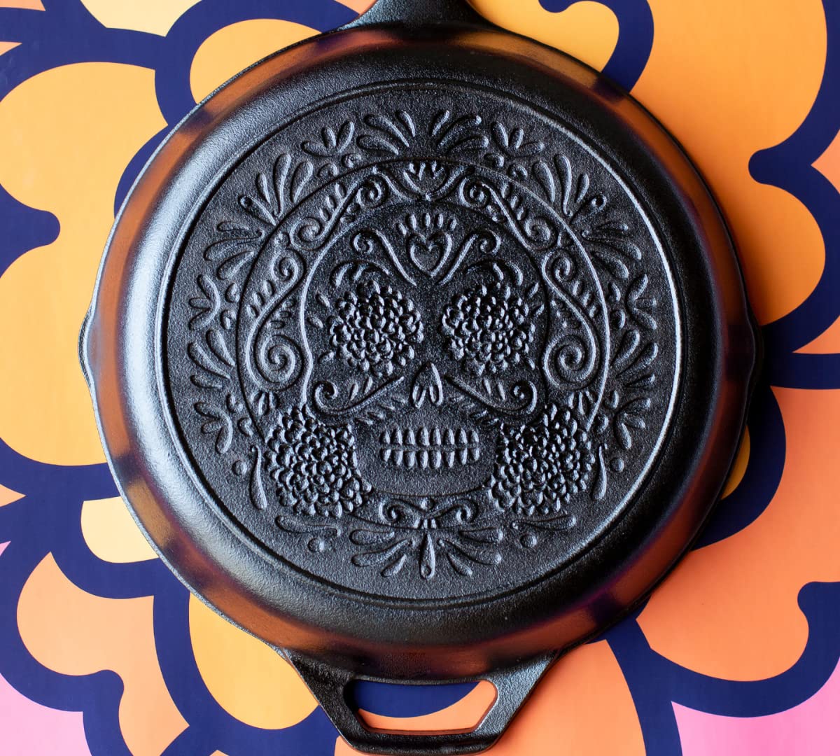 Lodge Sugar Skull skillet made in USA emphasizes durability.