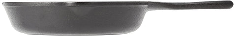 Lodge Wildlife Series wolf skillet handle close-up highlights ergonomic grip and heat retention