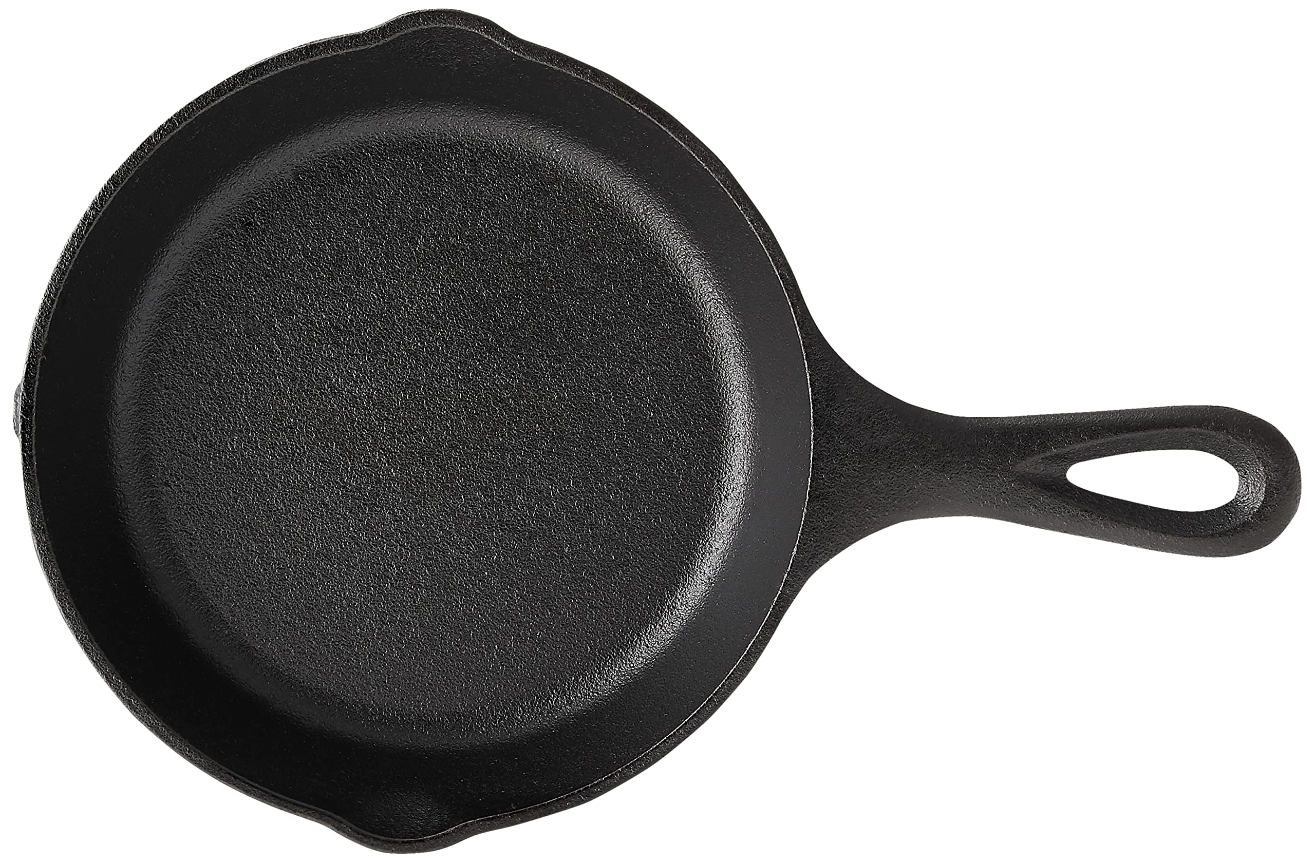 Lodge Wildlife Series wolf skillet on stove demonstrates even heating for searing