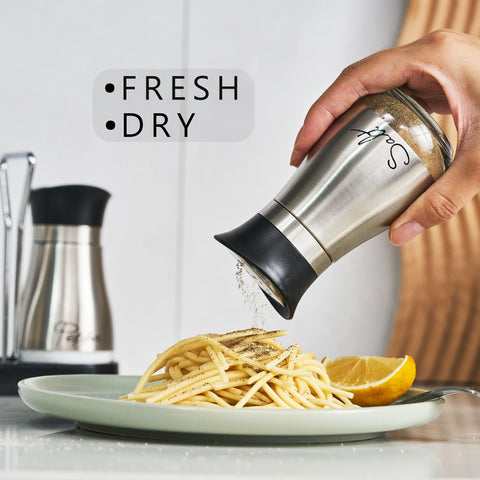 Lonffery shakers held in hand show portable carrying holder for on-the-go seasoning.