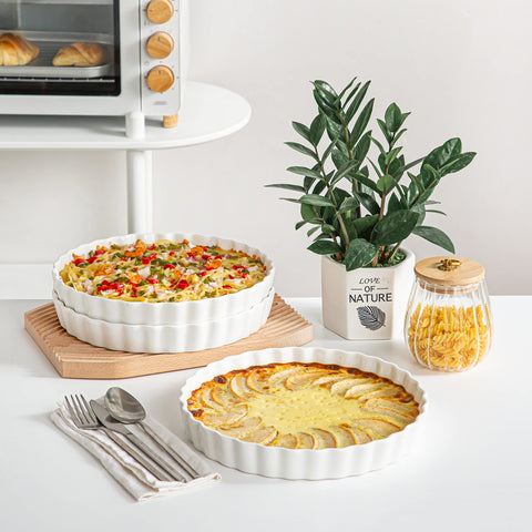 Lovecasa quiche pan shows enhanced grip on fluted-edge design during handling.