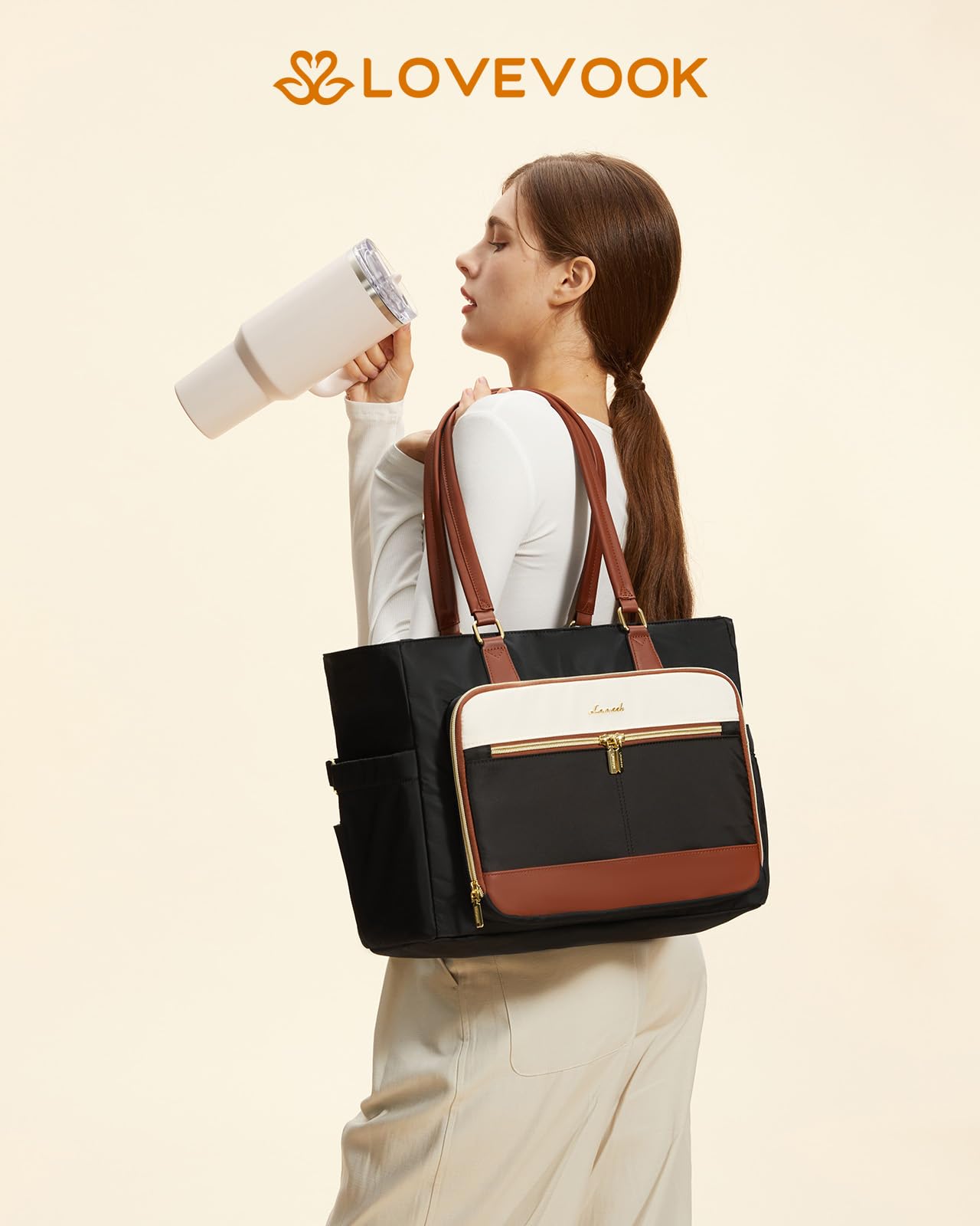 LOVEVOOK lunch tote with padded laptop sleeve protecting a 15.6-inch device