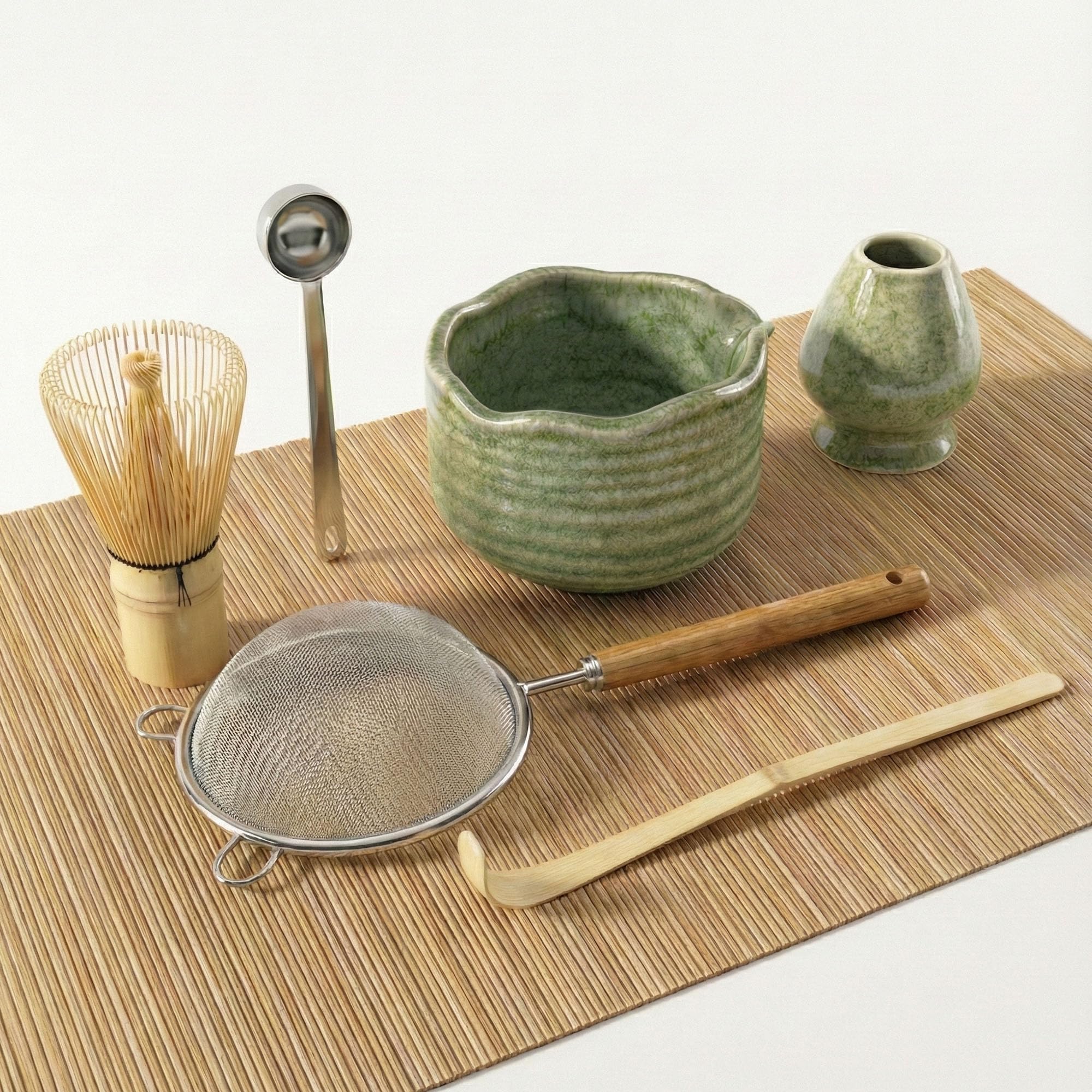 Loyal Sea matcha bowl with pouring spout and celadon glaze.