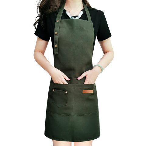 Loyglif apron green canvas front view offering full coverage for cooking messes.