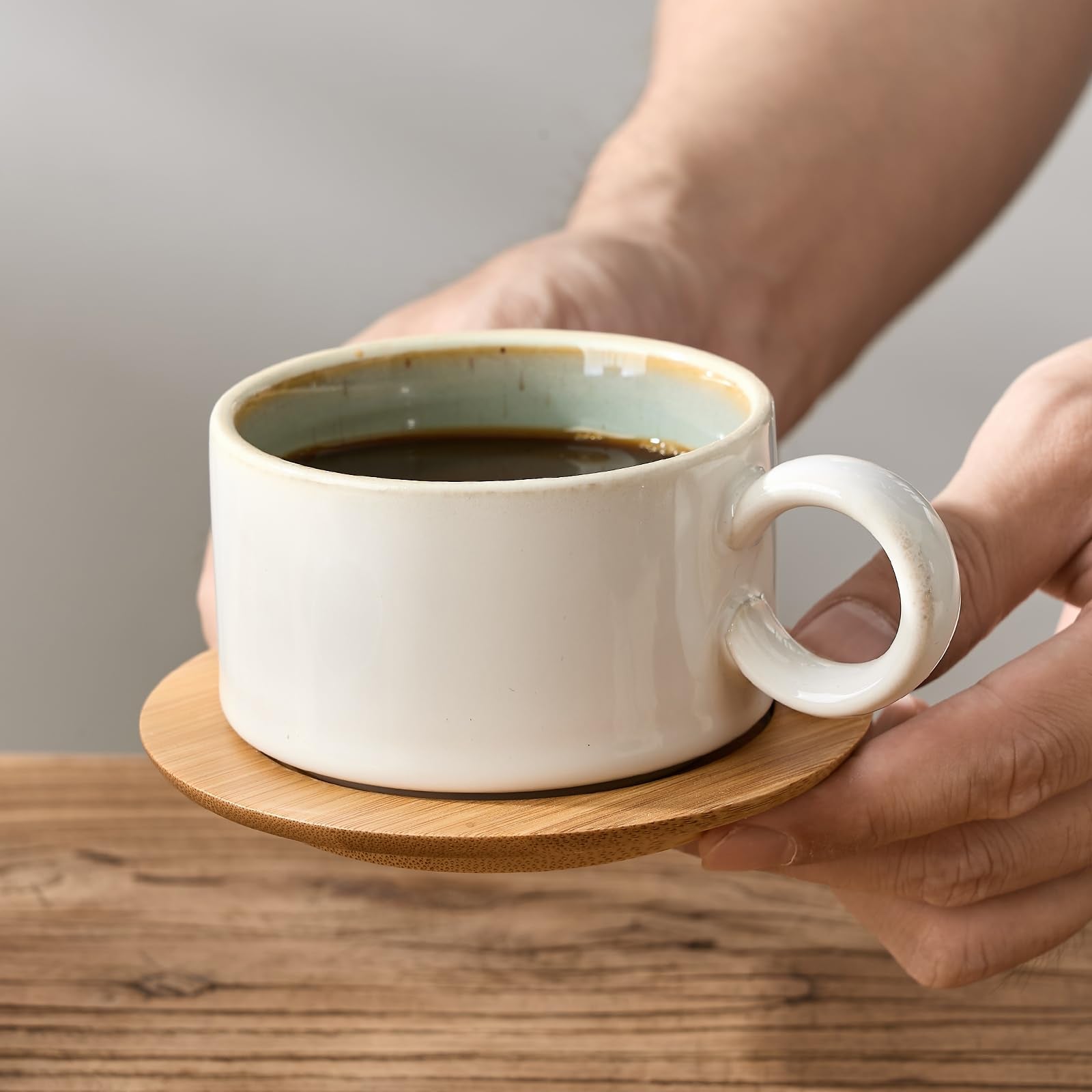 LUKA stackable cups and saucers simplify hosting and cleanup.