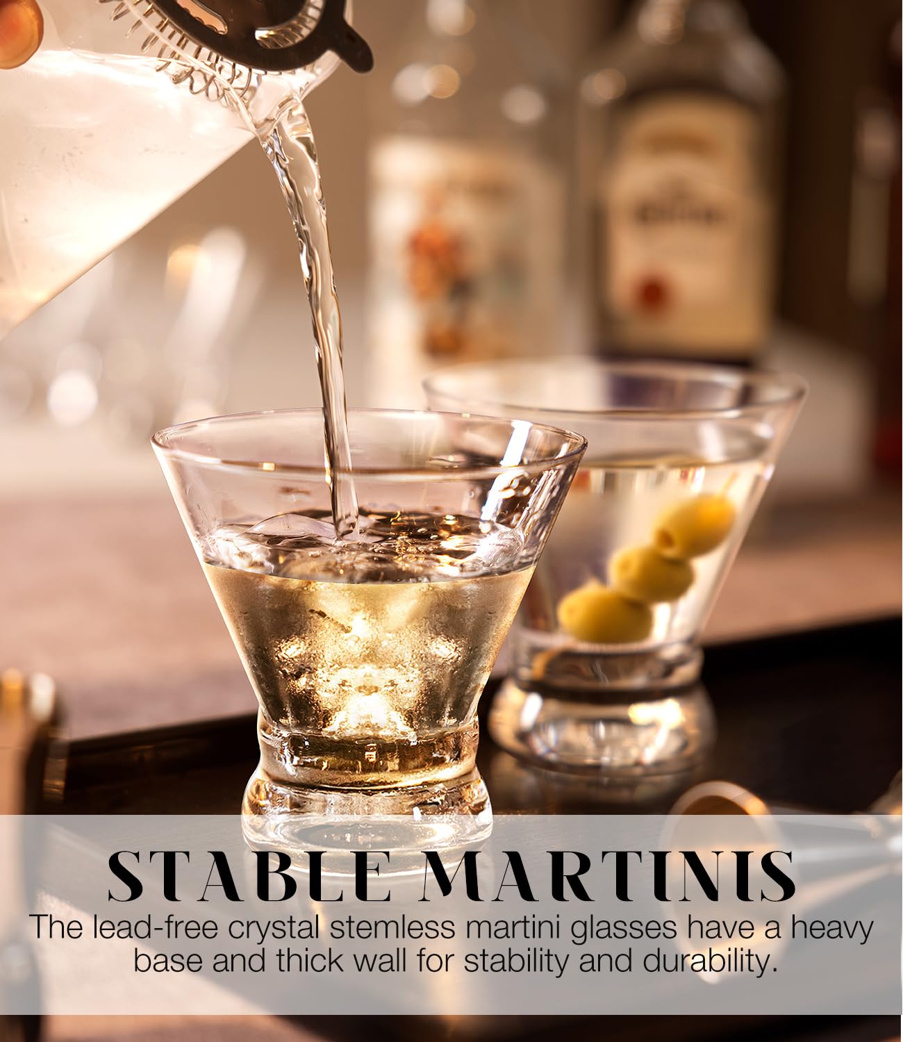 Luna & Mantha crystal-clear stemless martini glasses highlight the elegant design.
