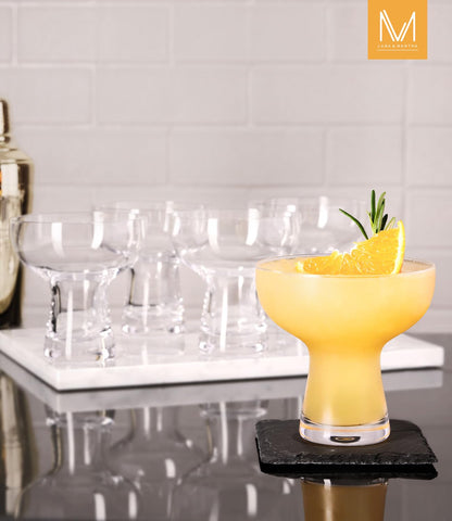 Luna & Mantha rim-friendly bowed-top glass emphasizes garnishes