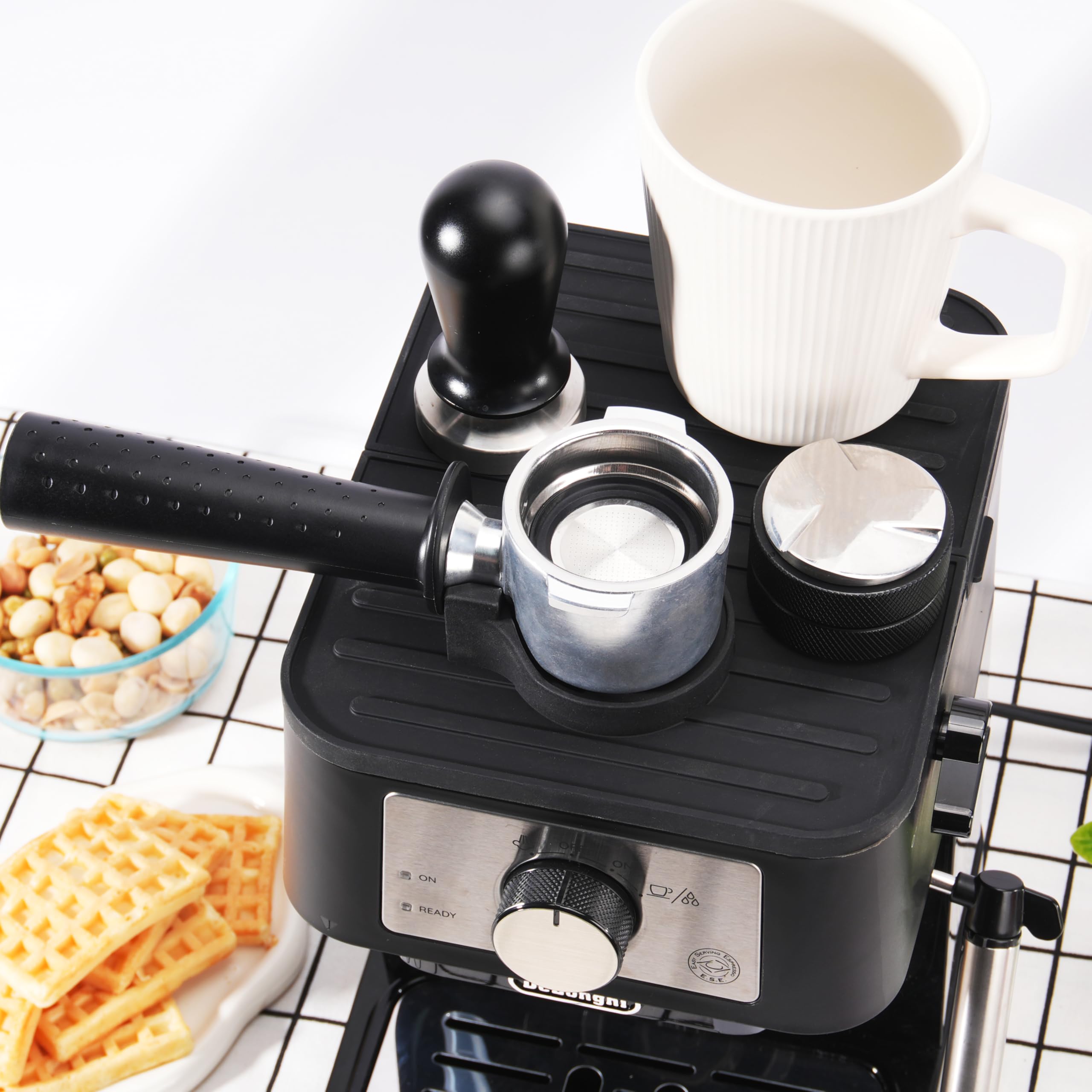 LUVCOSY tamping mat promotes easy cleanup after coffee prep