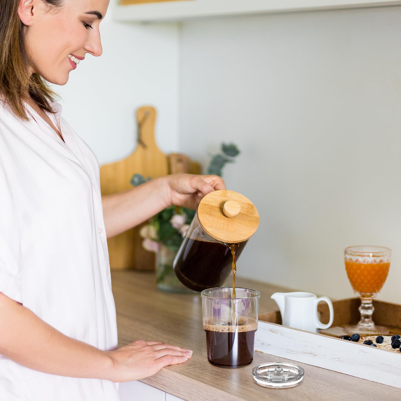 Luxfuel amber tumbler in car cupholder showcases travel-ready design.