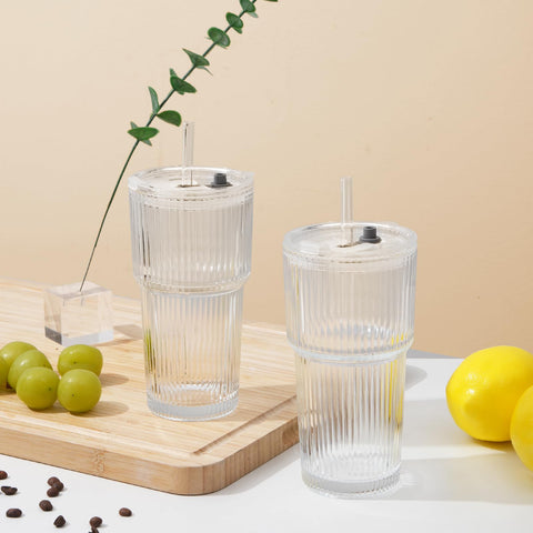 LUXULISH set of four ribbed glass tumblers on table; ready for entertaining or daily use.