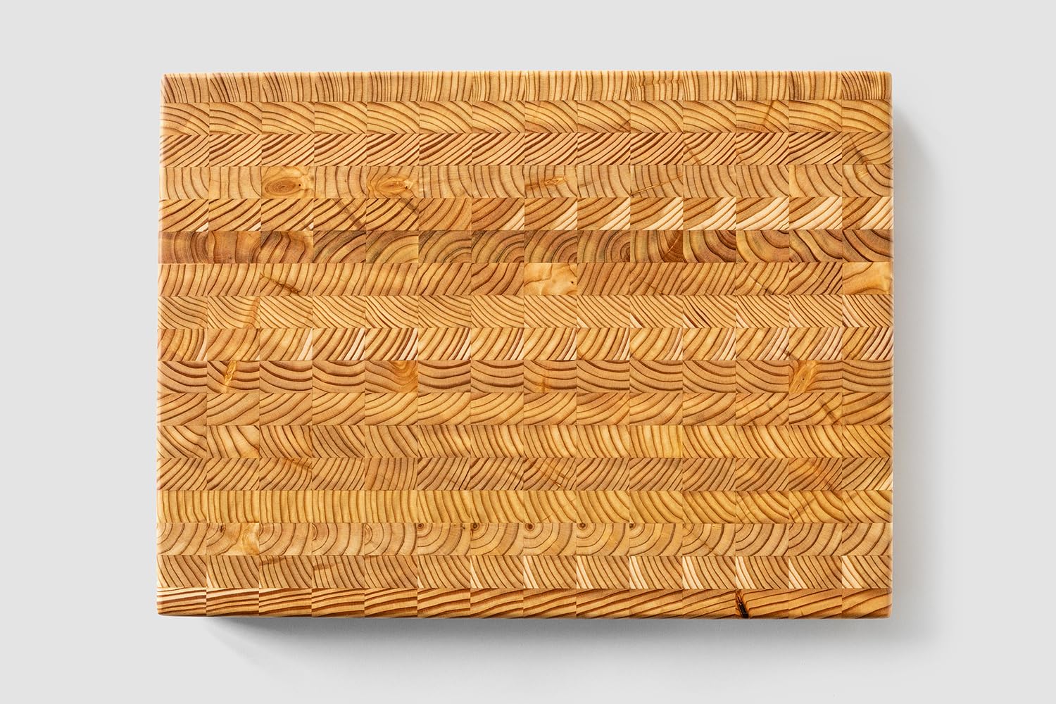 LW Handmade Larch Wood Canada end grain board close-up reveals durable surface.