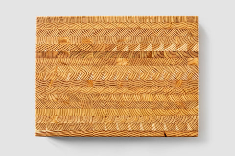 LW Handmade Larch Wood Canada end grain board close-up reveals durable surface.