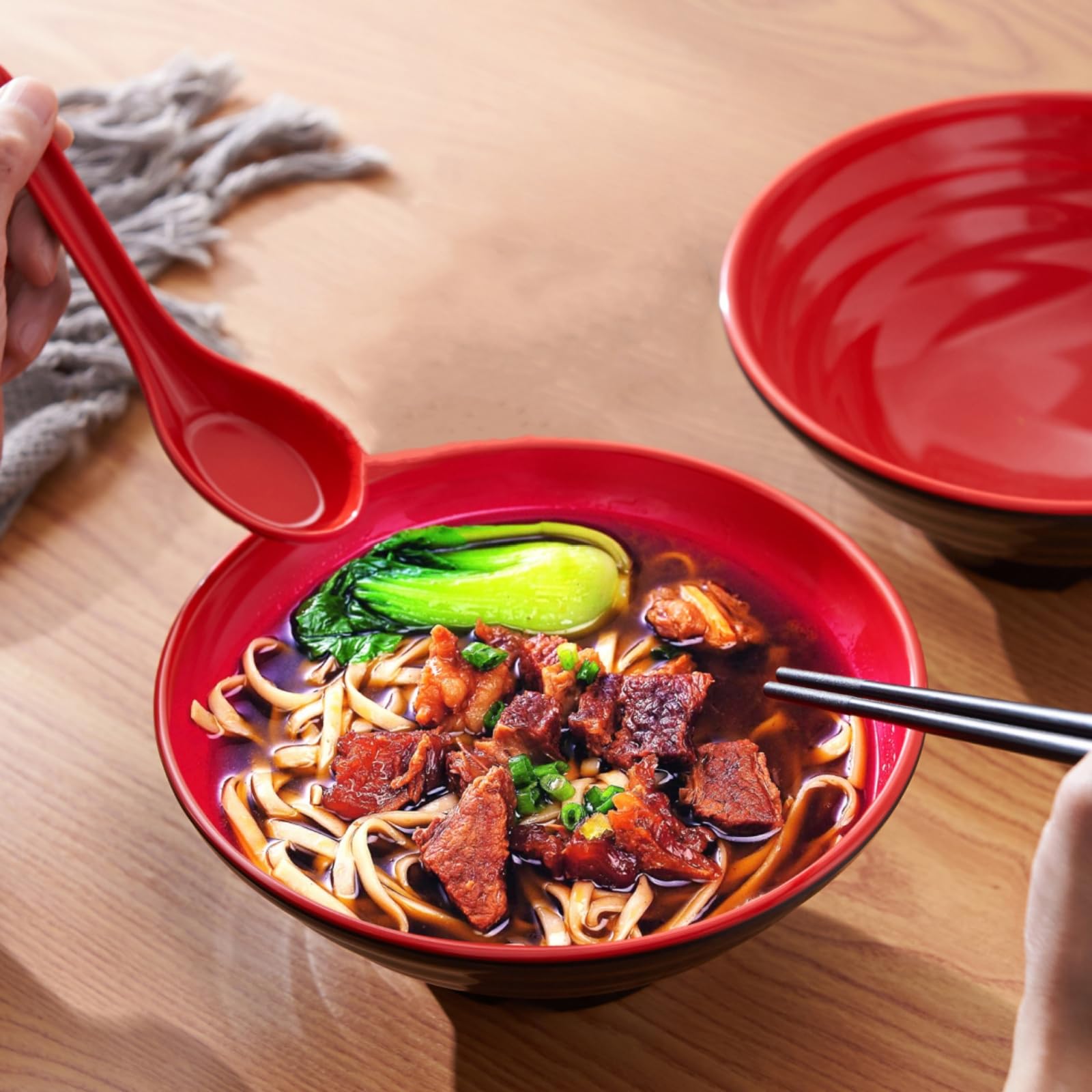 Lyellfe table display setup with ramen bowls and utensils