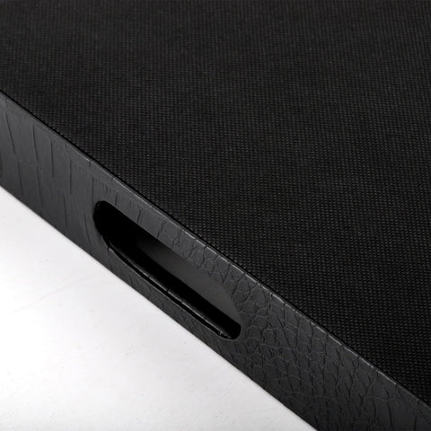 Lyellfe tray on a coffee table enhances decor while organizing essentials.