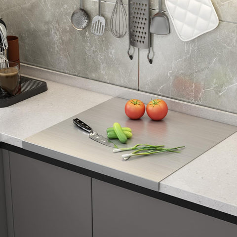 LYHLYA stainless steel cutting board in dishwasher demonstrates easy cleaning and sanitation.
