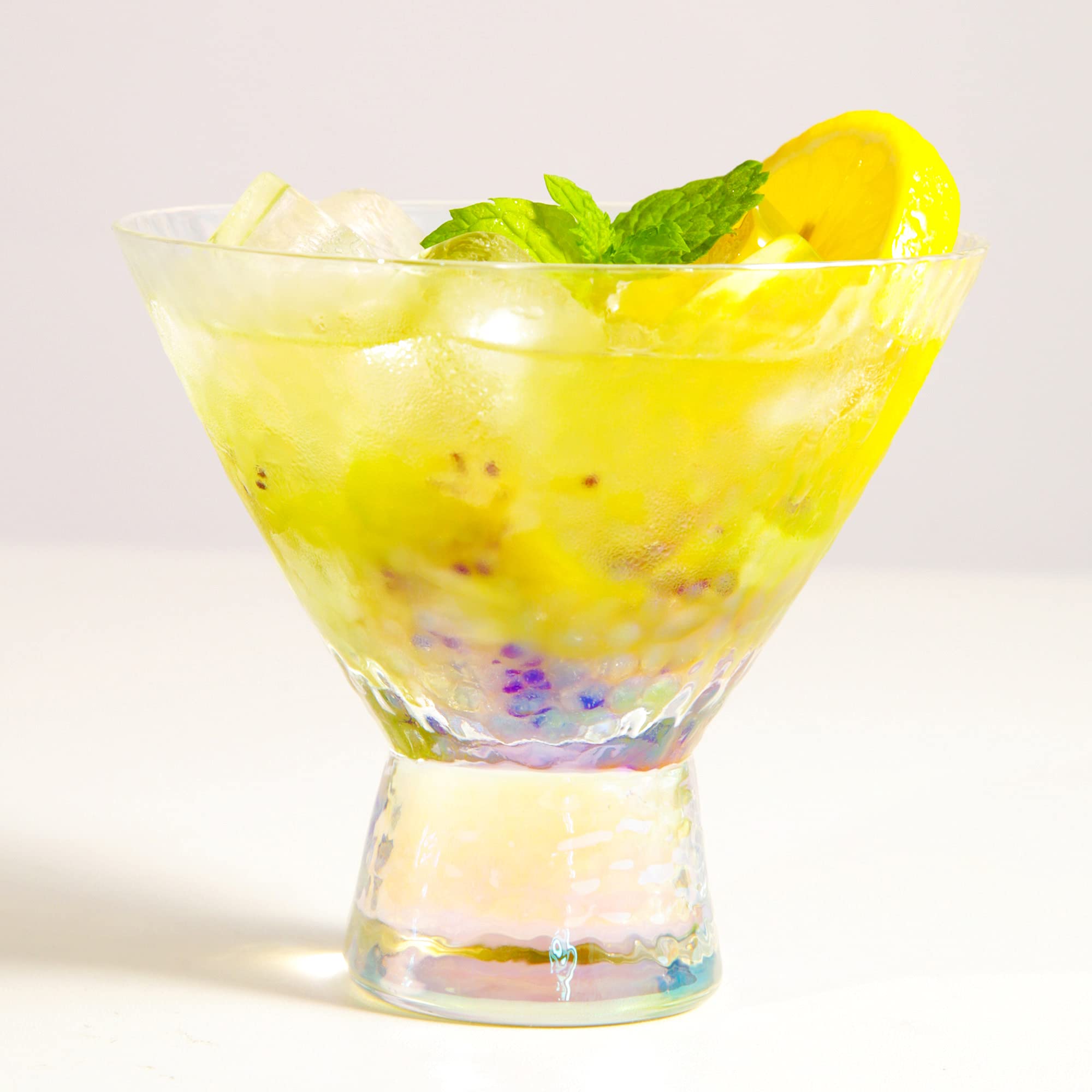 Lysenn iridescent stemless martini glasses full set on a polished tray for weddings