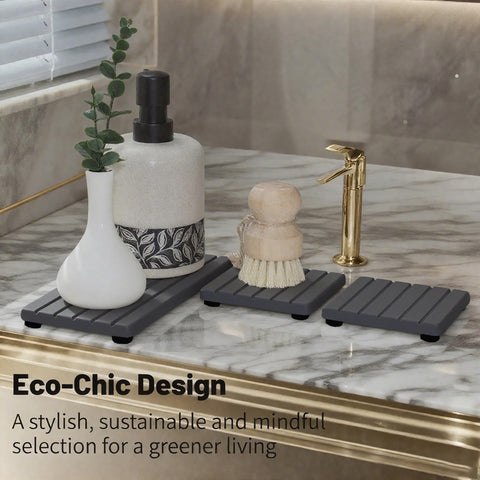 Lyxel stone drying tray arranged with soap, sponge, and toothbrush holder.