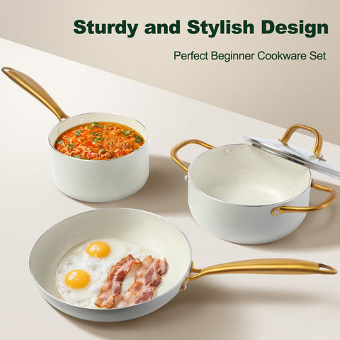 M MELENTA gold handles on cookware for comfortable, safe grip.