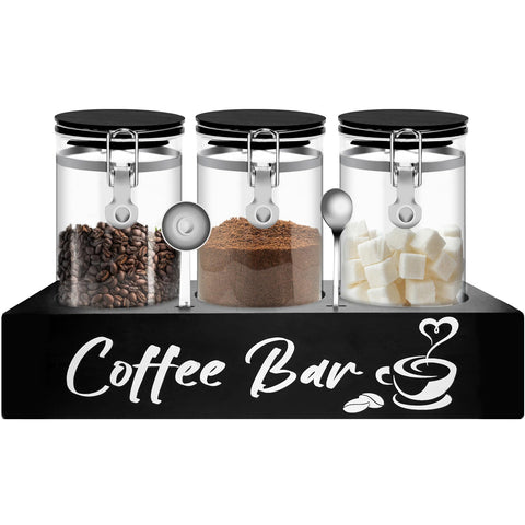 MACIFECI glass coffee containers on a black shelf for a cohesive coffee bar.
