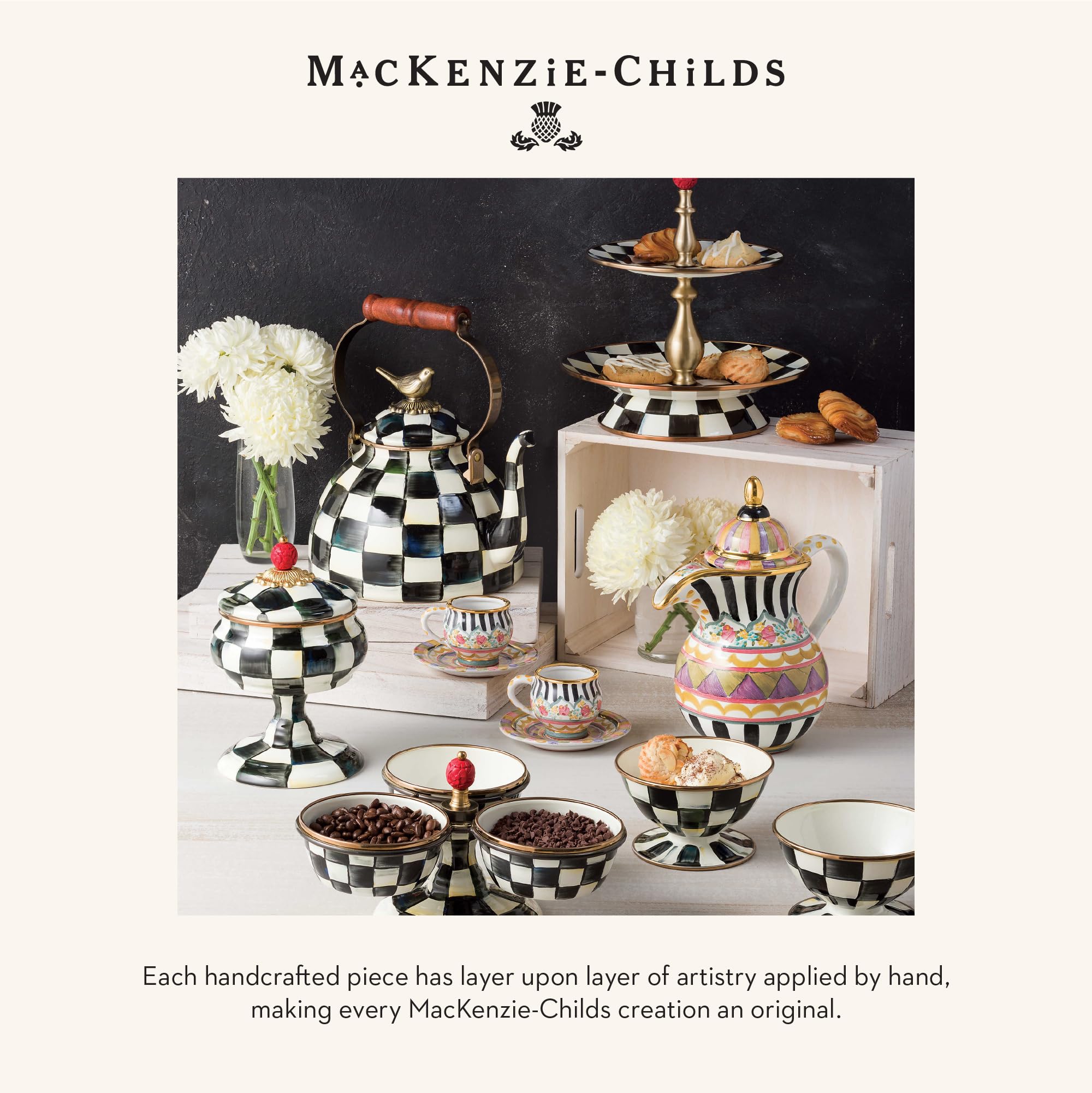MacKenzie-Childs ceramic napkin holder with gloss finish adds decorative charm.